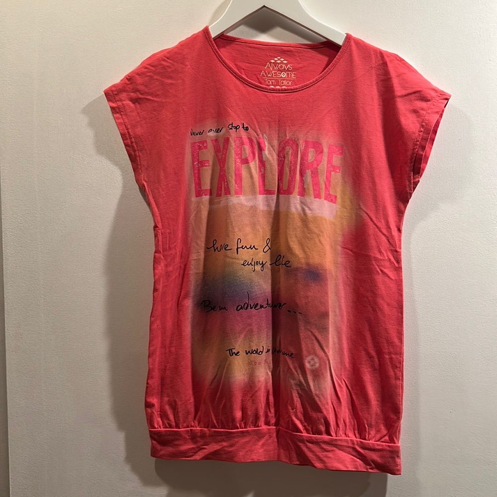 Salmon Colored shirt with slits in the shoulders. Can be a woman’s shirt size S